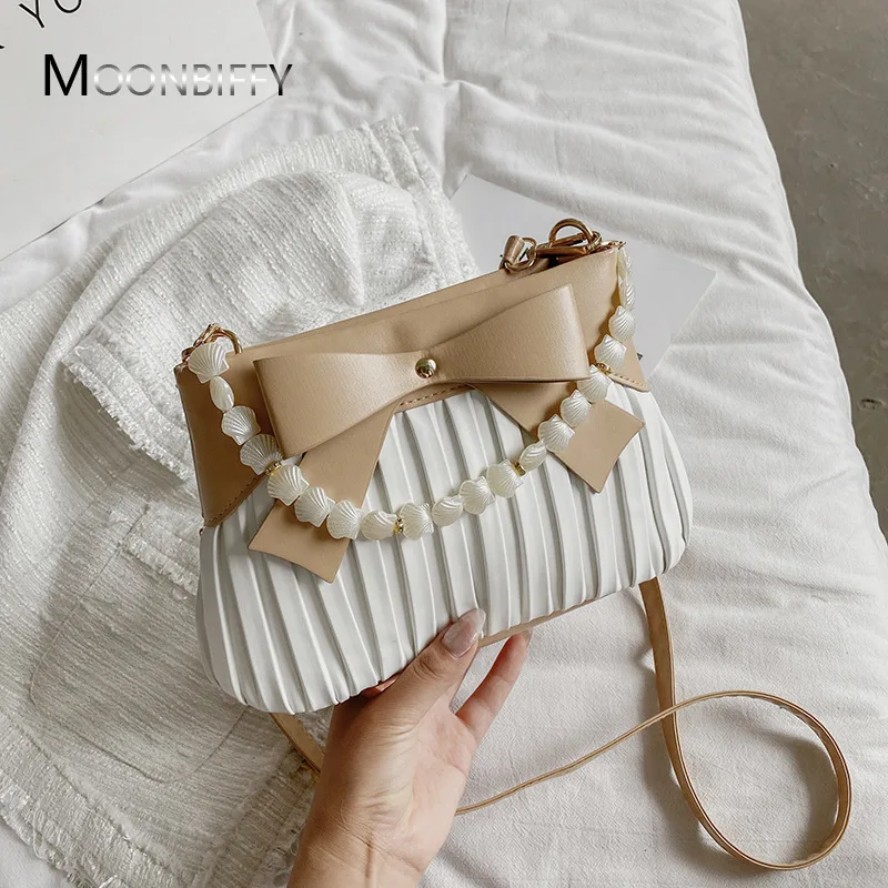 Women Messenger Bags Women BagsSimple Luxury Designer Handbags Leather Korean Shoulder Messenger Bags Women's Pearl Handbags
Women Messenger Bags Women BagsSimple Luxury Designer Handbags Leather Korean Shoulder Messenger Bags Women's Pearl Handbags