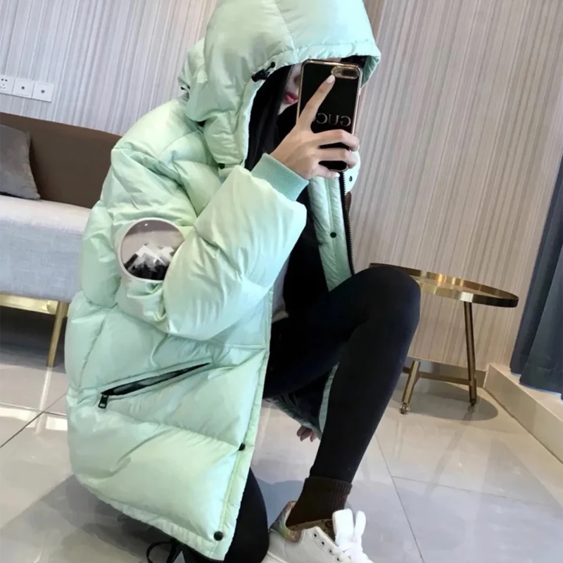 Autumn and winter new long-sleeved white duck down casual men's stand-up collar knitted sleeve light book golf jacket sweater
Autumn and winter new long-sleeved white duck down casual men's stand-up collar knitted sleeve light book golf jacket sweater