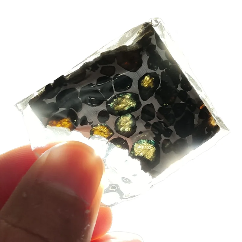 High-quality Olive Meteorite 14.1 Grams Tian Iron Meteorite Natural Meteorite Material Slice Specimen Size 47.3*40.3MM 
High-quality Olive Meteorite 14.1 Grams Tian Iron Meteorite Natural Meteorite Material Slice Specimen Size 47.3*40.3MM