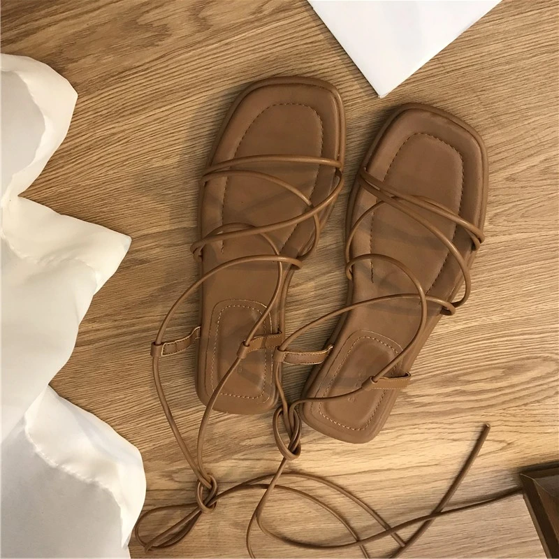 Сандалии женские с открытым носком, модные пикантные пляжные туфли на плоской подошве, с перекрестными завязками, сказочный стиль, туфли с узкими ремешками, черные, в римском стиле, лето 2023
Сандалии женские с открытым носком, модные пикантные пляжные туфли на плоской подошве, с перекрестными завязками, сказочный стиль, туфли с узкими ремешками, черные, в римском стиле, лето 2023