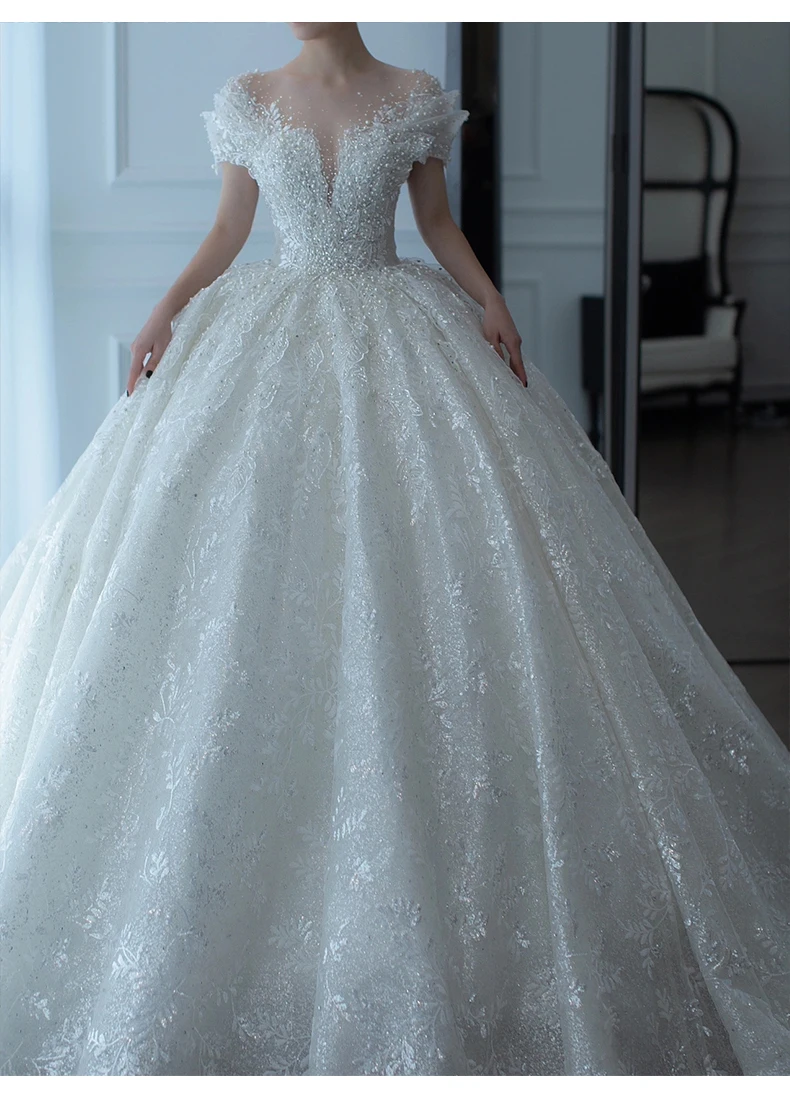 2023 New Gossamer V-neck Luxury Wedding Dress Off The Shoulder Sexy Lace Applique Princess Wedding Gown With Pearls
2023 New Gossamer V-neck Luxury Wedding Dress Off The Shoulder Sexy Lace Applique Princess Wedding Gown With Pearls