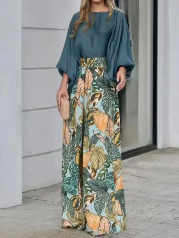 Freeacy Solid Color Loose Puff Sleeves T-shirt Top and High Waisted Wide Leg Pants Skirt Autumn Casual Two Piece Set for Women
Freeacy Solid Color Loose Puff Sleeves T-shirt Top and High Waisted Wide Leg Pants Skirt Autumn Casual Two Piece Set for Women