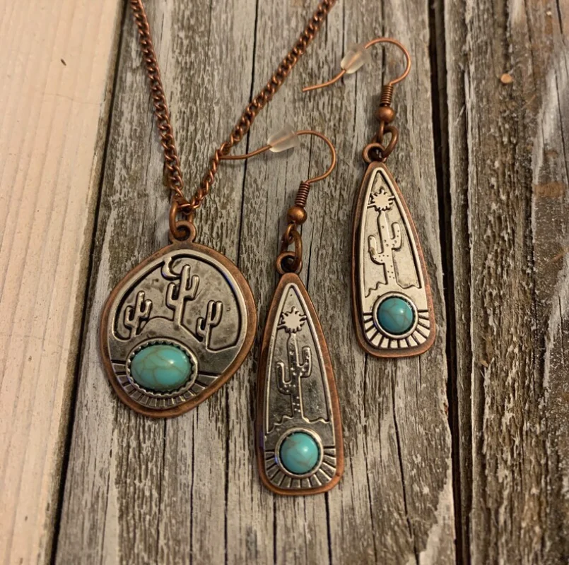 Ethnic Style Round Inlaid Blue Stone Earrings Vintage Water Droplet Carved Cactus Dangle Earrings for Women
Ethnic Style Round Inlaid Blue Stone Earrings Vintage Water Droplet Carved Cactus Dangle Earrings for Women