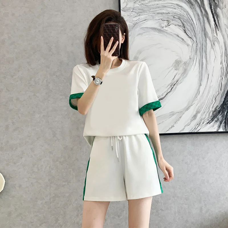 Fashion Korean Shorts Suit Women Summer Two Pieces Sets New 2022 Loose Short Sleeve Top + Drawstring Tracksuit Pant Casual Sets
Fashion Korean Shorts Suit Women Summer Two Pieces Sets New 2022 Loose Short Sleeve Top + Drawstring Tracksuit Pant Casual Sets