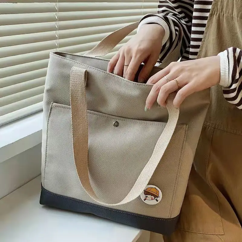 Commuter Canvas Bag Women's Bag Large-capacity Shoulder Bag Handbag Casual Wild College Student Class Bag Durable Out Goth Bag
Commuter Canvas Bag Women's Bag Large-capacity Shoulder Bag Handbag Casual Wild College Student Class Bag Durable Out Goth Bag