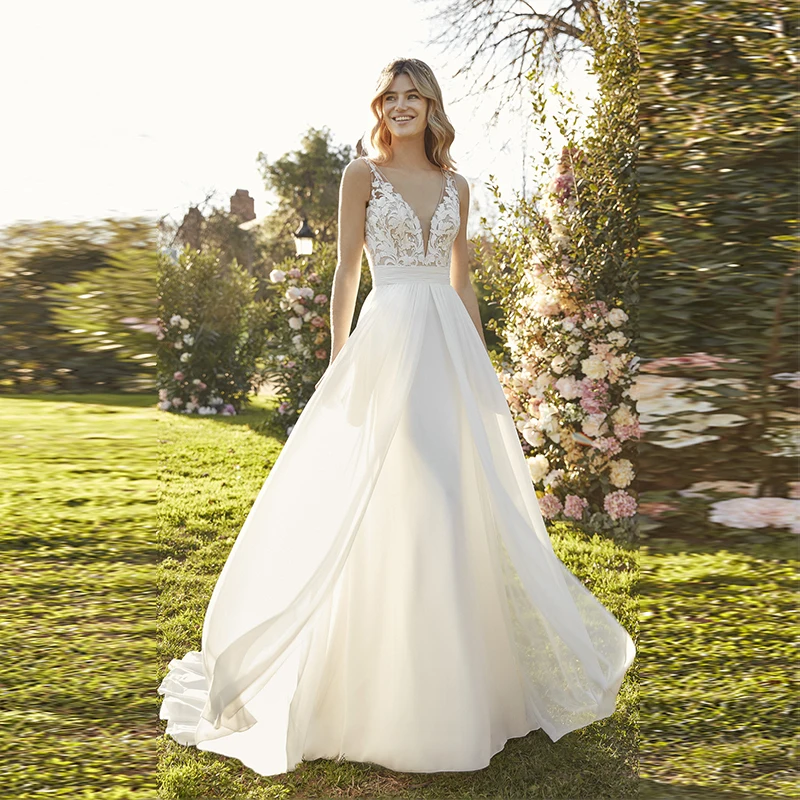 Simple Sleeveless Wedding Dress 2022 Appliques V Neck Illusion Back Court Train A Line Bridal Gown Custom Made To Measures Beach
Simple Sleeveless Wedding Dress 2022 Appliques V Neck Illusion Back Court Train A Line Bridal Gown Custom Made To Measures Beach