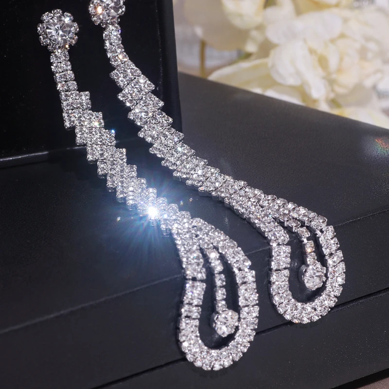 Женские серьги-подвески серебряного цвета, с подвесками
Женские серьги-подвески серебряного цвета, с подвесками