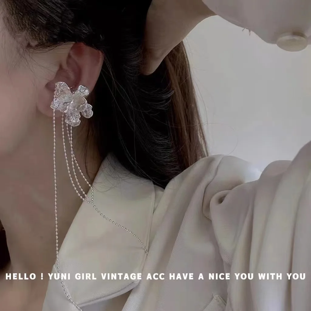 Silver-white tinfoil flower tassel ear bone clip versatile simple daily sweet cool earless piercing earrings
Silver-white tinfoil flower tassel ear bone clip versatile simple daily sweet cool earless piercing earrings