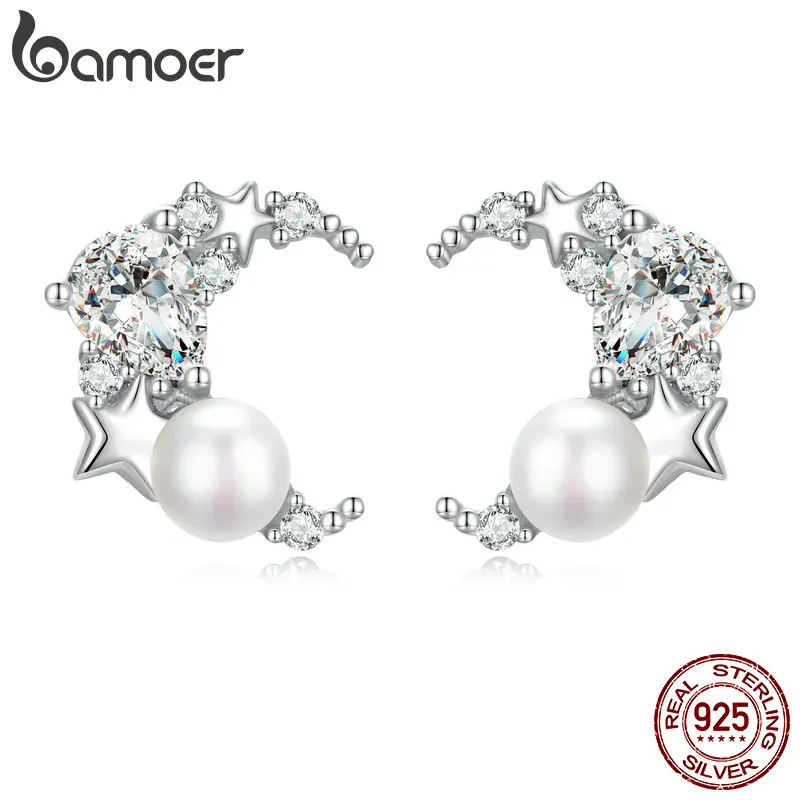 Серьги-гвоздики серебряные в виде полумесяца и жемчуга 
Серьги-гвоздики серебряные в виде полумесяца и жемчуга