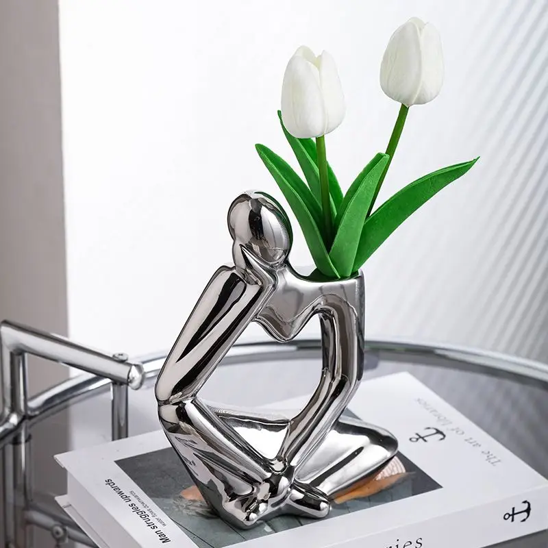 Abstract portrait art vase ornaments Simple modern living room TV cabinet Wine cabinet Home decoration
Abstract portrait art vase ornaments Simple modern living room TV cabinet Wine cabinet Home decoration