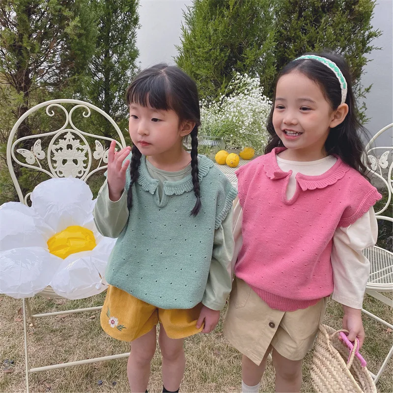 Spring girls cute knitted waistcoats Baby girls solid color hollow sleeveless vests 
Spring girls cute knitted waistcoats Baby girls solid color hollow sleeveless vests
