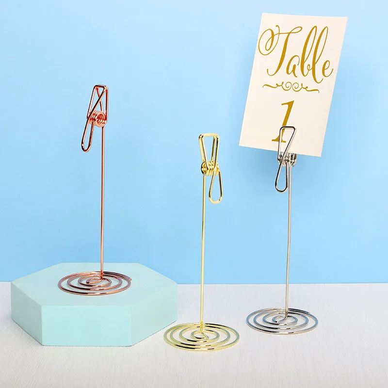 Metal Note Holder Message Folder Iron Table Number Card Stand Paper Clamp Romantic Postcard Photo Clip Desktop Decoration
Metal Note Holder Message Folder Iron Table Number Card Stand Paper Clamp Romantic Postcard Photo Clip Desktop Decoration