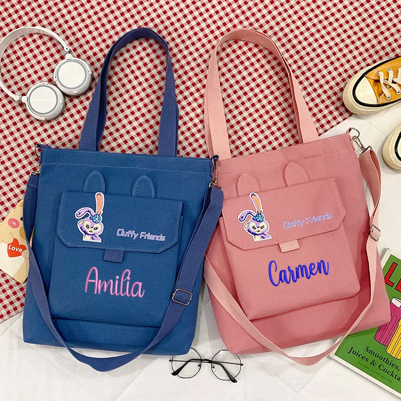 Personalized Cute Canvas Bag One-Shoulder Messenger Student Backpack Custom Embroidered Large-Capacity Cartoon Handbag LOGO
Personalized Cute Canvas Bag One-Shoulder Messenger Student Backpack Custom Embroidered Large-Capacity Cartoon Handbag LOGO