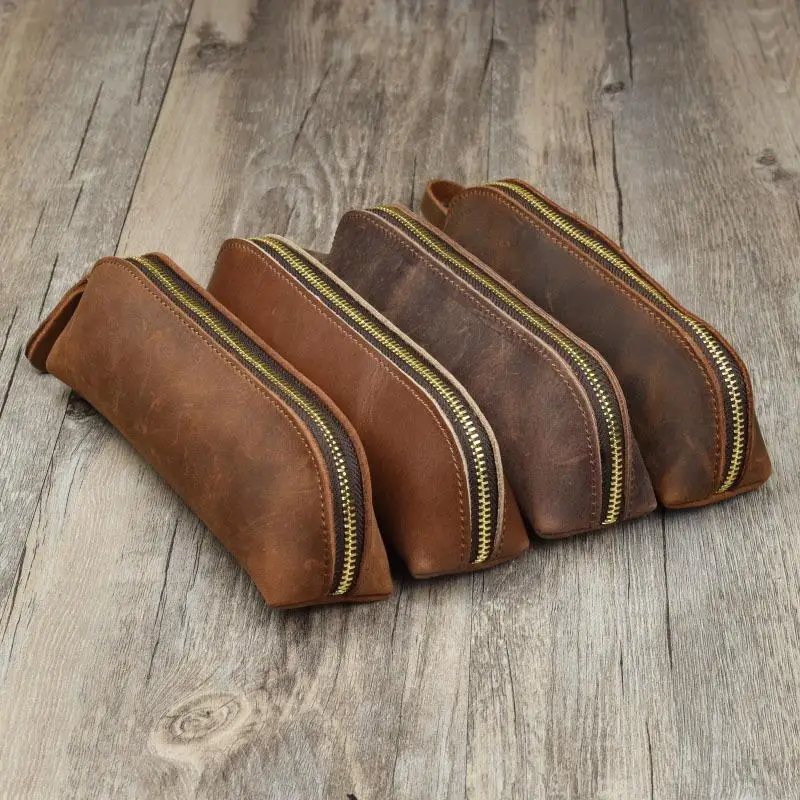 Leather handmade pen bag men and women retro simple stationery pen box pen storage zipper glasses bag
Leather handmade pen bag men and women retro simple stationery pen box pen storage zipper glasses bag
