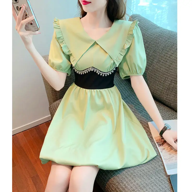 In the Summer of 2022, the New French Bubble Sleeve Agaric Doll Collar Dress Women's Waist Stitching Fake Two-piece Skirt
In the Summer of 2022, the New French Bubble Sleeve Agaric Doll Collar Dress Women's Waist Stitching Fake Two-piece Skirt