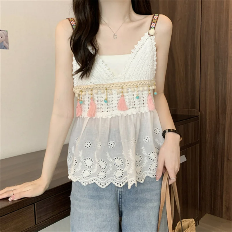 Bohemian Ethnic Suspenders with New Knitted Embroidered Cutout Cropped Vests with Sleeveless Blouses Underneath A Blouse
Bohemian Ethnic Suspenders with New Knitted Embroidered Cutout Cropped Vests with Sleeveless Blouses Underneath A Blouse