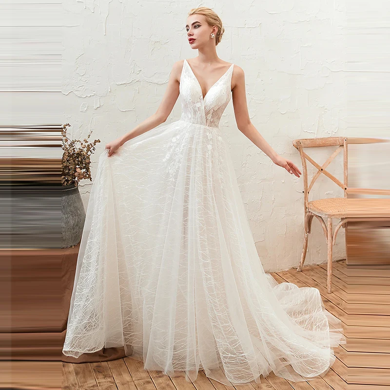 Sexy Women's Deep V-Neck Bridal Dresses A-Shaped Sleeveless Backless Bohemian Wedding Gowns Tulle 2023 Robe De Mariée Vestido
Sexy Women's Deep V-Neck Bridal Dresses A-Shaped Sleeveless Backless Bohemian Wedding Gowns Tulle 2023 Robe De Mariée Vestido
