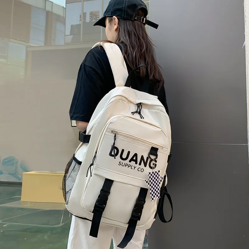 College style large letters large capacity neutral front pocket lock student schoolbag 2022 junior high school backpack
College style large letters large capacity neutral front pocket lock student schoolbag 2022 junior high school backpack