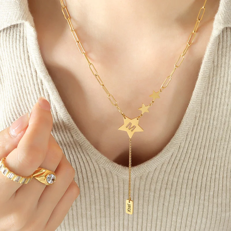 European and American Fashion Hollow Personality Niche Original Design XINGX Lucky Letter Tassel Pendant Female Titanium Steel N
European and American Fashion Hollow Personality Niche Original Design XINGX Lucky Letter Tassel Pendant Female Titanium Steel N