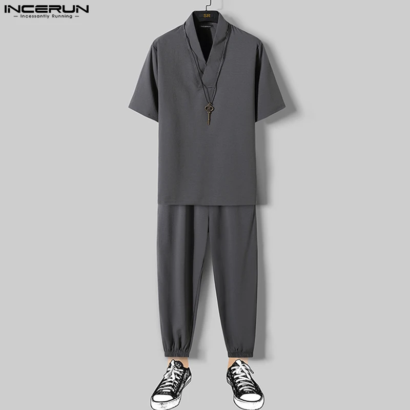 INCERUN Men Sets Solid Harajuku V Neck Short Sleeve Shirt & Drawstring Pants 2PCS Streetwear Vintage Cotton Men Casual Suits 5XL
INCERUN Men Sets Solid Harajuku V Neck Short Sleeve Shirt & Drawstring Pants 2PCS Streetwear Vintage Cotton Men Casual Suits 5XL
