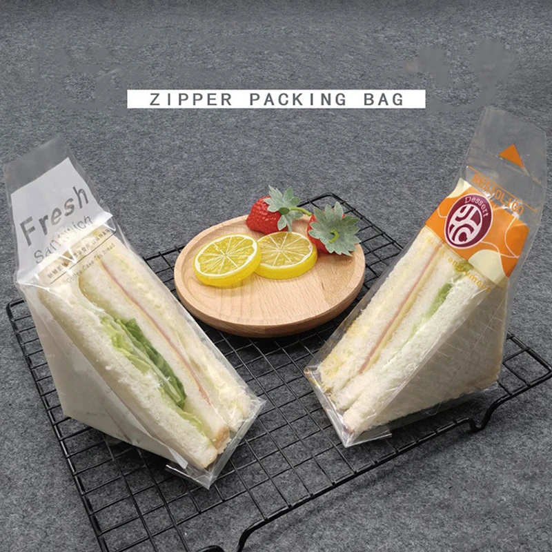 100Pcs Clear Bags Bread Trigon Sandwiches Bag With Bottom Baking Food Packing Bag
100Pcs Clear Bags Bread Trigon Sandwiches Bag With Bottom Baking Food Packing Bag