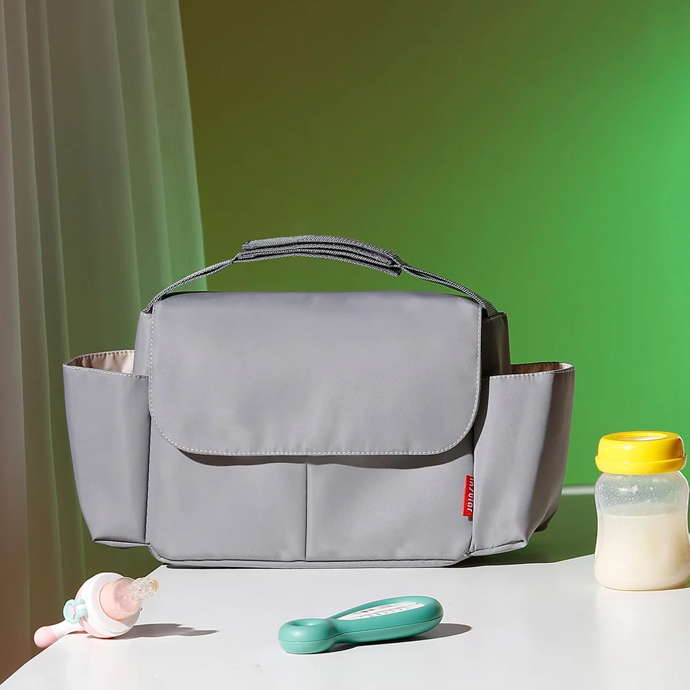Многофункциональная Водонепроницаемая нейлоновая сумка для детской коляски для бутылочек с водой, подгузников, вместительные сумки для коляски, сумка для мамы
Многофункциональная Водонепроницаемая нейлоновая сумка для детской коляски для бутылочек с водой, подгузников, вместительные сумки для коляски, сумка для мамы