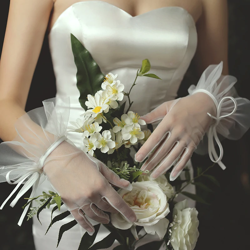 Bridal Gloves Transparent Gloves Ivory Wedding Short Wrist Gloves Women Marriage Evening Party Prom Dresses Accessories 
Bridal Gloves Transparent Gloves Ivory Wedding Short Wrist Gloves Women Marriage Evening Party Prom Dresses Accessories