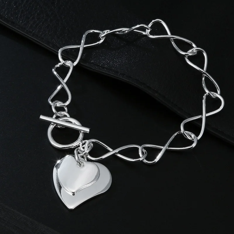 European and American Copper Plating925Sterling Silver Jeweleries Women's Heart8Word Hanging Doppel Herz Bracelet Jewelry Charm
European and American Copper Plating925Sterling Silver Jeweleries Women's Heart8Word Hanging Doppel Herz Bracelet Jewelry Charm