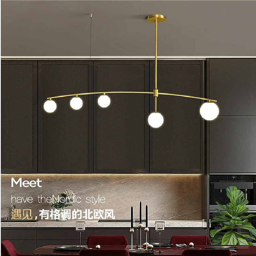 Modern minimalist glass ball gold/black iron chandelier Nordic indoor long chandelier office bar kitchen restaurant lighting
Modern minimalist glass ball gold/black iron chandelier Nordic indoor long chandelier office bar kitchen restaurant lighting
