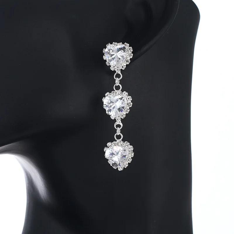 Japanese and Korean Micro Set Zircon Earrings New High-quality Jewelry Peach Heart Rhinestone Earrings Women's Ear Jewelry
Japanese and Korean Micro Set Zircon Earrings New High-quality Jewelry Peach Heart Rhinestone Earrings Women's Ear Jewelry