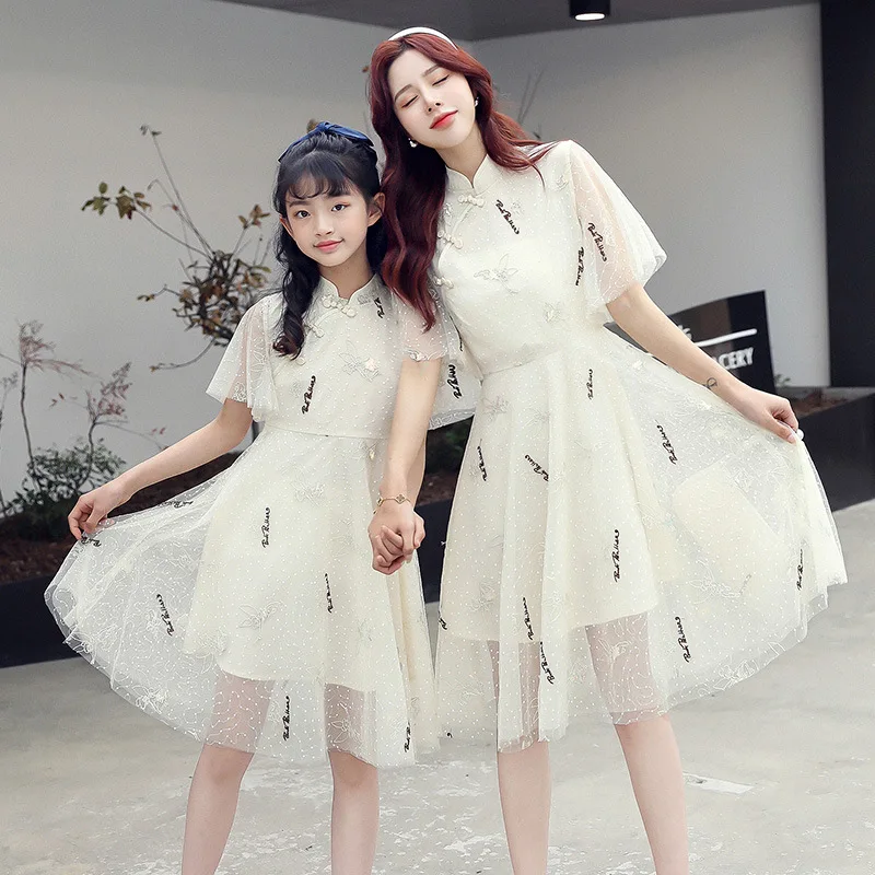 Qipao For Girls Summer Mother and Kid Matching Clothes Letter Print Mesh Tulle Dress Fashion Outfits Traditional Ethnic Costumes
Qipao For Girls Summer Mother and Kid Matching Clothes Letter Print Mesh Tulle Dress Fashion Outfits Traditional Ethnic Costumes