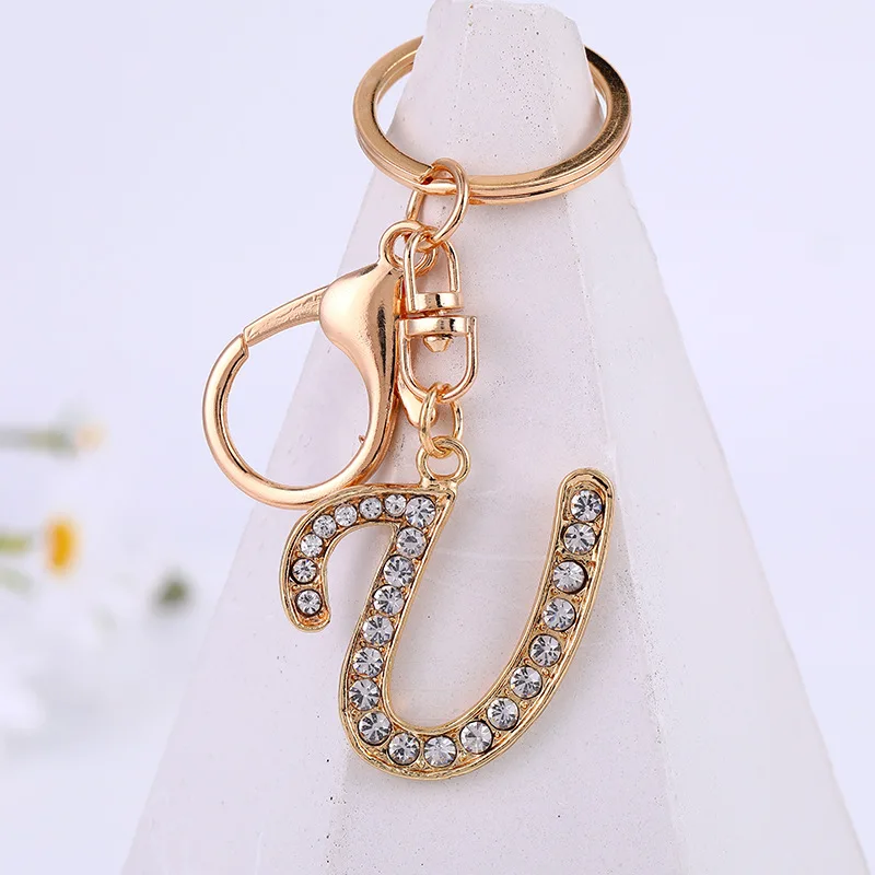 Wholesale 2022 new metal inlaid diamond chic font 26 English letters keychain key accessories small gifts
Wholesale 2022 new metal inlaid diamond chic font 26 English letters keychain key accessories small gifts