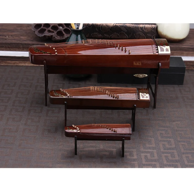 Miniature Guzheng Model Replica with Stand and Case Mini Zither Mini Musical Instrument Ornaments Chinese Traditional Gifts
Miniature Guzheng Model Replica with Stand and Case Mini Zither Mini Musical Instrument Ornaments Chinese Traditional Gifts
