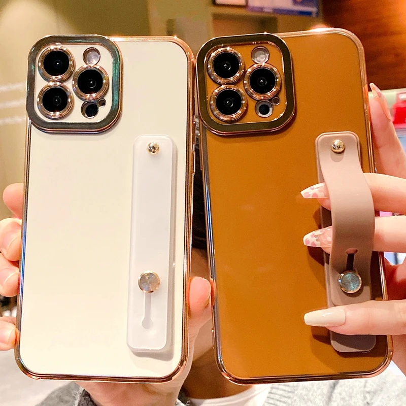 Soft Electroplated Wrist Strap Phone Case For iPhone 11 12 13 Pro Max XS X XR 7 8 Plus SE 2020 Shockproof Bumper Back Cover
Soft Electroplated Wrist Strap Phone Case For iPhone 11 12 13 Pro Max XS X XR 7 8 Plus SE 2020 Shockproof Bumper Back Cover