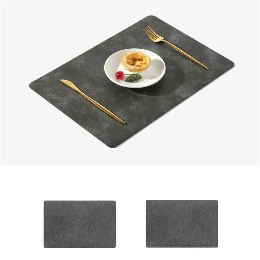 Nordic Style Placemat Table Mat Tableware Pad PU Leather Waterproof Heat Insulation Non-Slip Soft Insulation Pad Heat-Resistan
Nordic Style Placemat Table Mat Tableware Pad PU Leather Waterproof Heat Insulation Non-Slip Soft Insulation Pad Heat-Resistan