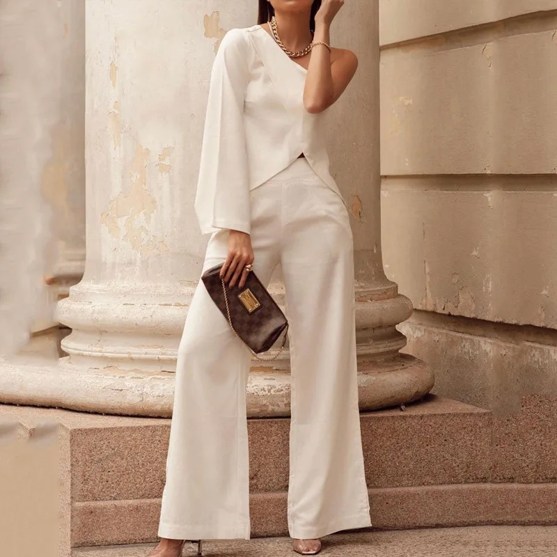 Women's Suit 2023 Solid Color Sexy One Shoulder Long Sleeve Top Loose Wide Leg Pants Two-Piece Set
Women's Suit 2023 Solid Color Sexy One Shoulder Long Sleeve Top Loose Wide Leg Pants Two-Piece Set