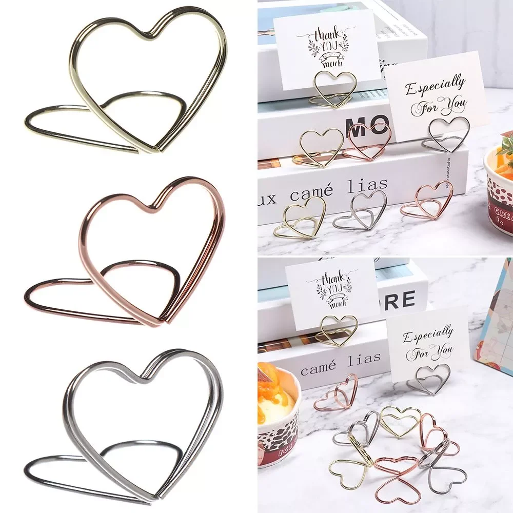 1pcs Cool Wedding Party Desktop Decoration Place Card Holder Romantic Heart Ring Shape Photo Clip Table Number Stand
1pcs Cool Wedding Party Desktop Decoration Place Card Holder Romantic Heart Ring Shape Photo Clip Table Number Stand