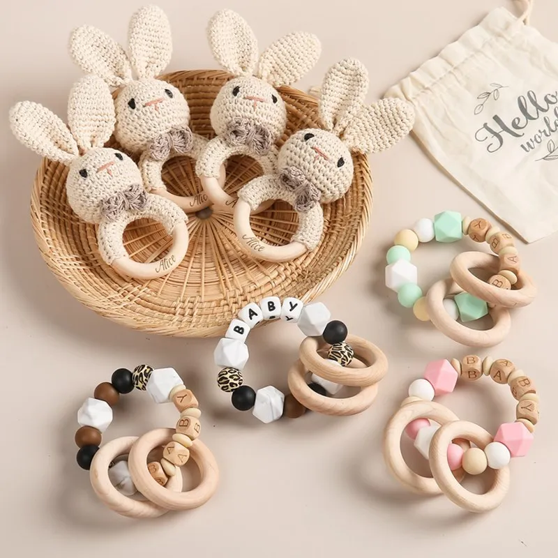 

2pcs Natural Organic Wood Baby Rattle Crochet Cartoon Animal Rabbit Teether Ring Customized Baby Feeding Bracelet Toy for Kids
