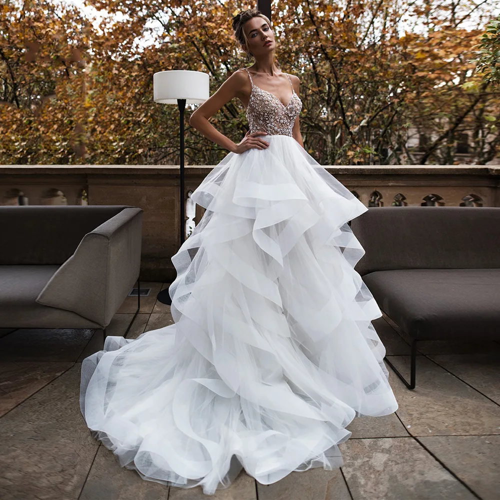 Sexy Spaghetti Strap Wedding Dress For Women V-Neck Backless Bridal Gown With Beadings Tulle A-Line Vestido De Novia 2022
Sexy Spaghetti Strap Wedding Dress For Women V-Neck Backless Bridal Gown With Beadings Tulle A-Line Vestido De Novia 2022