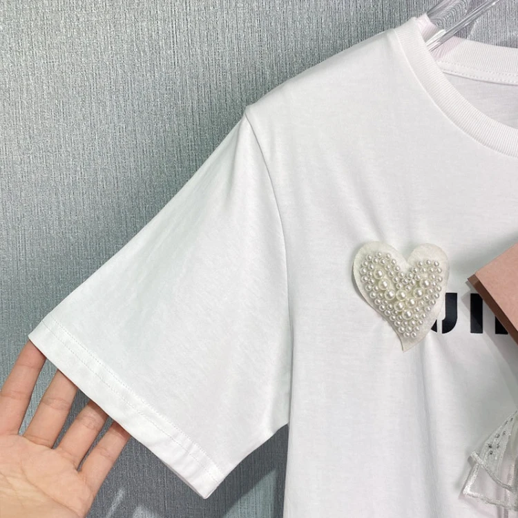 Fashion Classic Trendy Luxury Design Beaded Bow Flower Loose Letter Logo Print Short Sleeve T-shirt Women Cotton Top
Fashion Classic Trendy Luxury Design Beaded Bow Flower Loose Letter Logo Print Short Sleeve T-shirt Women Cotton Top