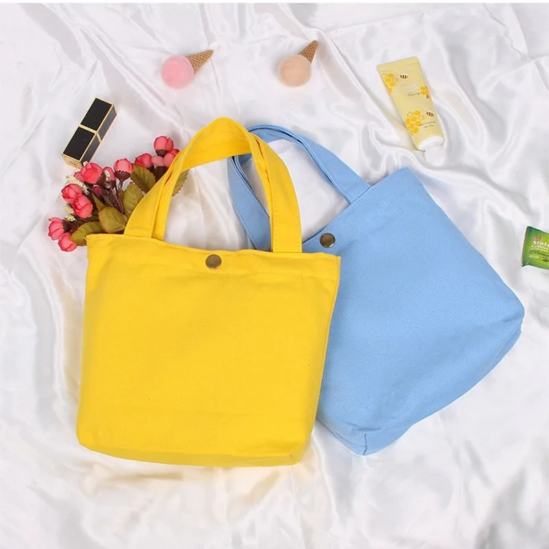 Canvas Simple Cosmetic Shopping Cloth Storage Bag Female Pure Solid Color Casual Totes Cotton Mini Handbag with Copper Buckle
Canvas Simple Cosmetic Shopping Cloth Storage Bag Female Pure Solid Color Casual Totes Cotton Mini Handbag with Copper Buckle