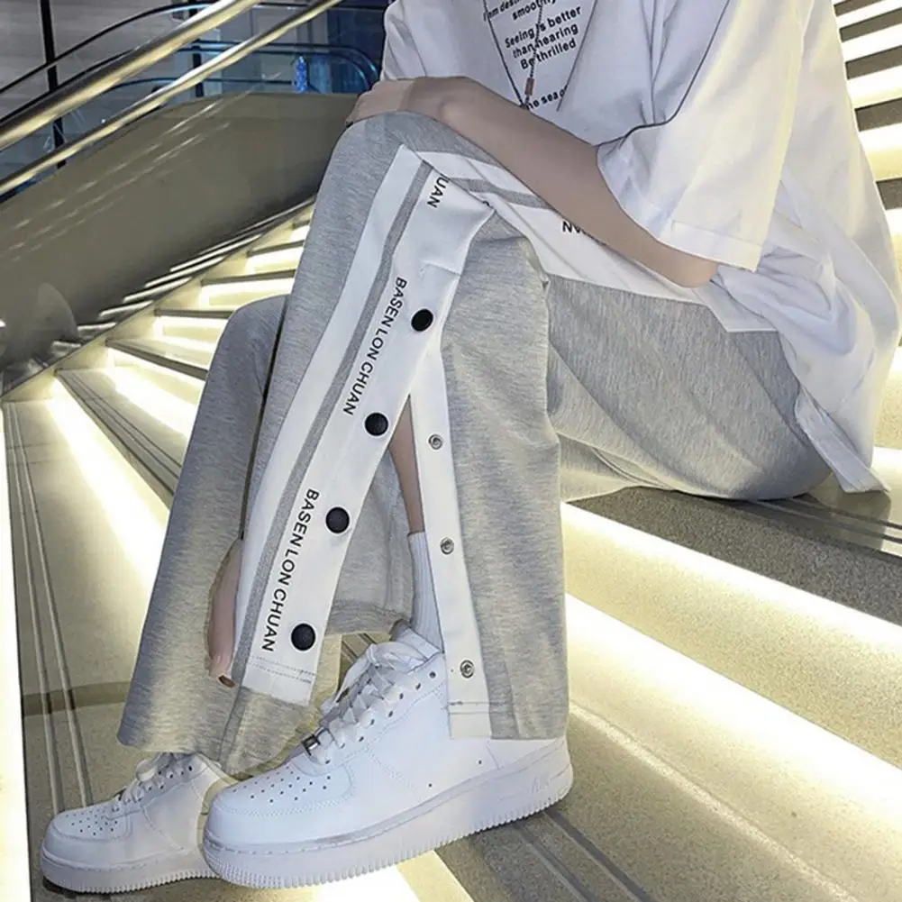 Men Sweatpants Loose Side Split Buttons Full Length Sports Elastic Waist Thin Letter Print Men Summer Pants Casual Male Clothes
Men Sweatpants Loose Side Split Buttons Full Length Sports Elastic Waist Thin Letter Print Men Summer Pants Casual Male Clothes