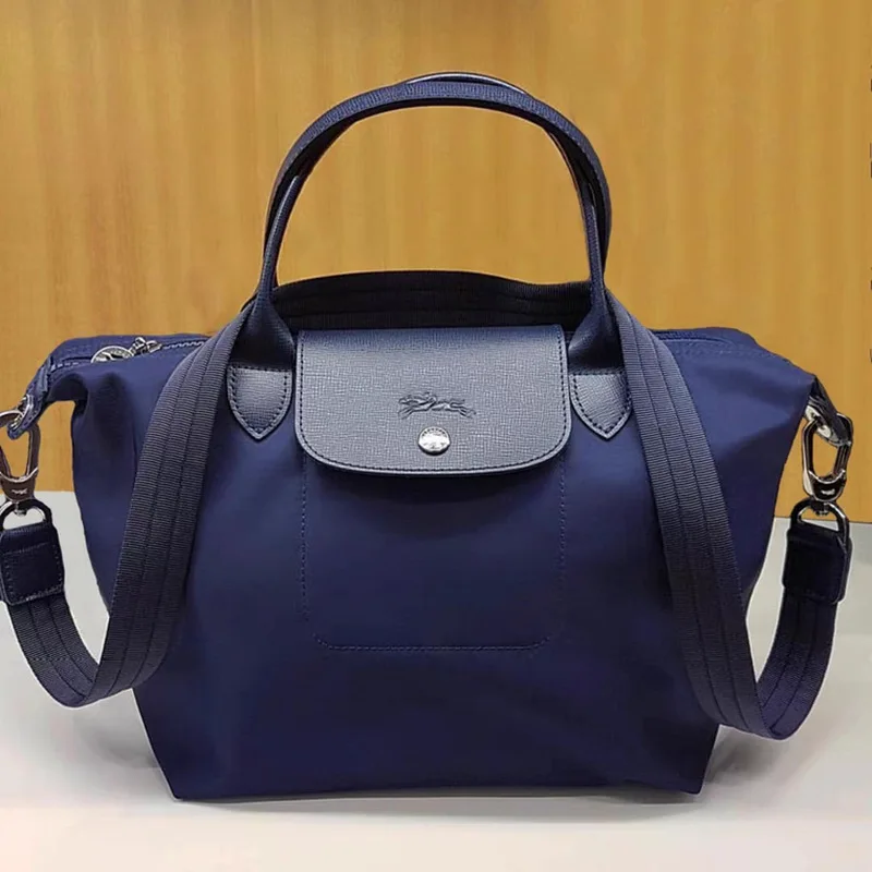 Longchamp fashion ladies canvas messenger bag 2021 nylon waterproof leather female handbag female student shoulder messenger
Longchamp fashion ladies canvas messenger bag 2021 nylon waterproof leather female handbag female student shoulder messenger