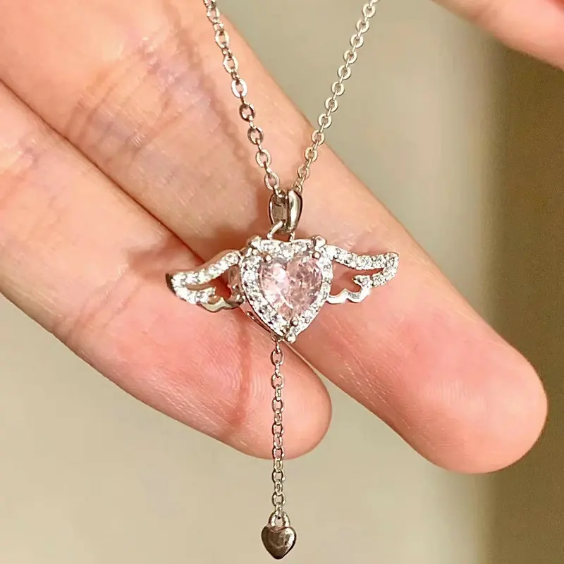 Korean Pink Zircon Angel Wings Heart Pendant Necklace for Women Simple Silver Color Long Chain Crystal Necklace Jewelery Party
Korean Pink Zircon Angel Wings Heart Pendant Necklace for Women Simple Silver Color Long Chain Crystal Necklace Jewelery Party