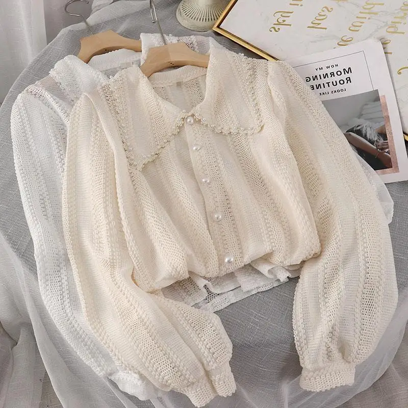Spring Elegant Lace Blouses Women New 2022 Hollow Out Peter Pan Collar Tops Fashion Office Ladies Long Sleeves Solid Shirt
Spring Elegant Lace Blouses Women New 2022 Hollow Out Peter Pan Collar Tops Fashion Office Ladies Long Sleeves Solid Shirt