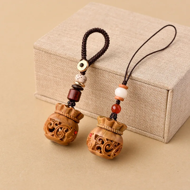 Green Sandalwood Money Bag Incense Pill Box Open Hollow Carving Mobile Phone Chain Keychain Men's and Women's Accessories
Green Sandalwood Money Bag Incense Pill Box Open Hollow Carving Mobile Phone Chain Keychain Men's and Women's Accessories