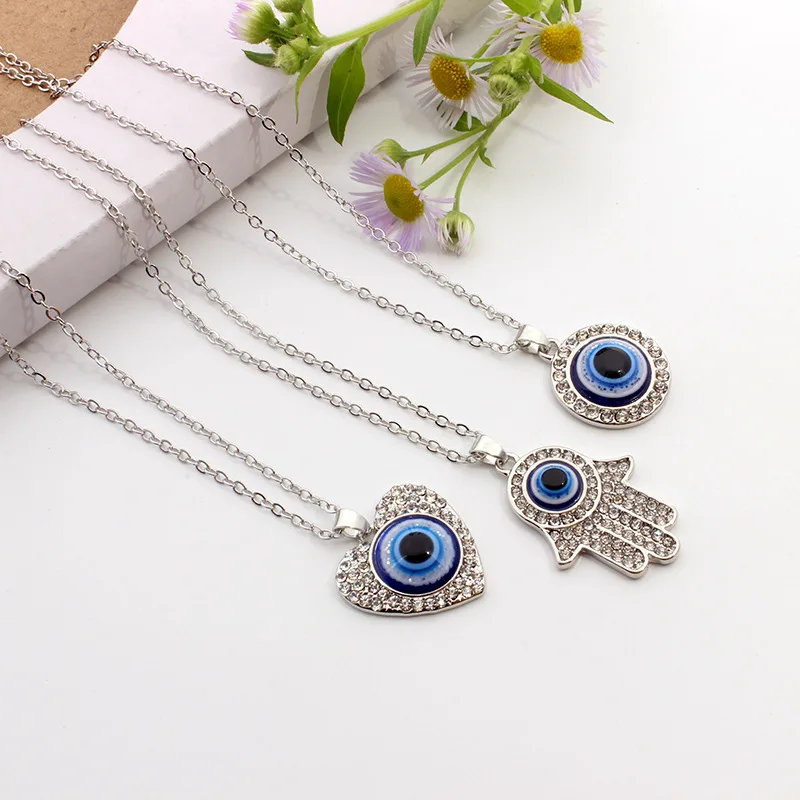 New Turkish Devil's Eye Necklace Diamond Heart Palm Round Blue Eye Pendant Necklace Fashion Jewerly
New Turkish Devil's Eye Necklace Diamond Heart Palm Round Blue Eye Pendant Necklace Fashion Jewerly
