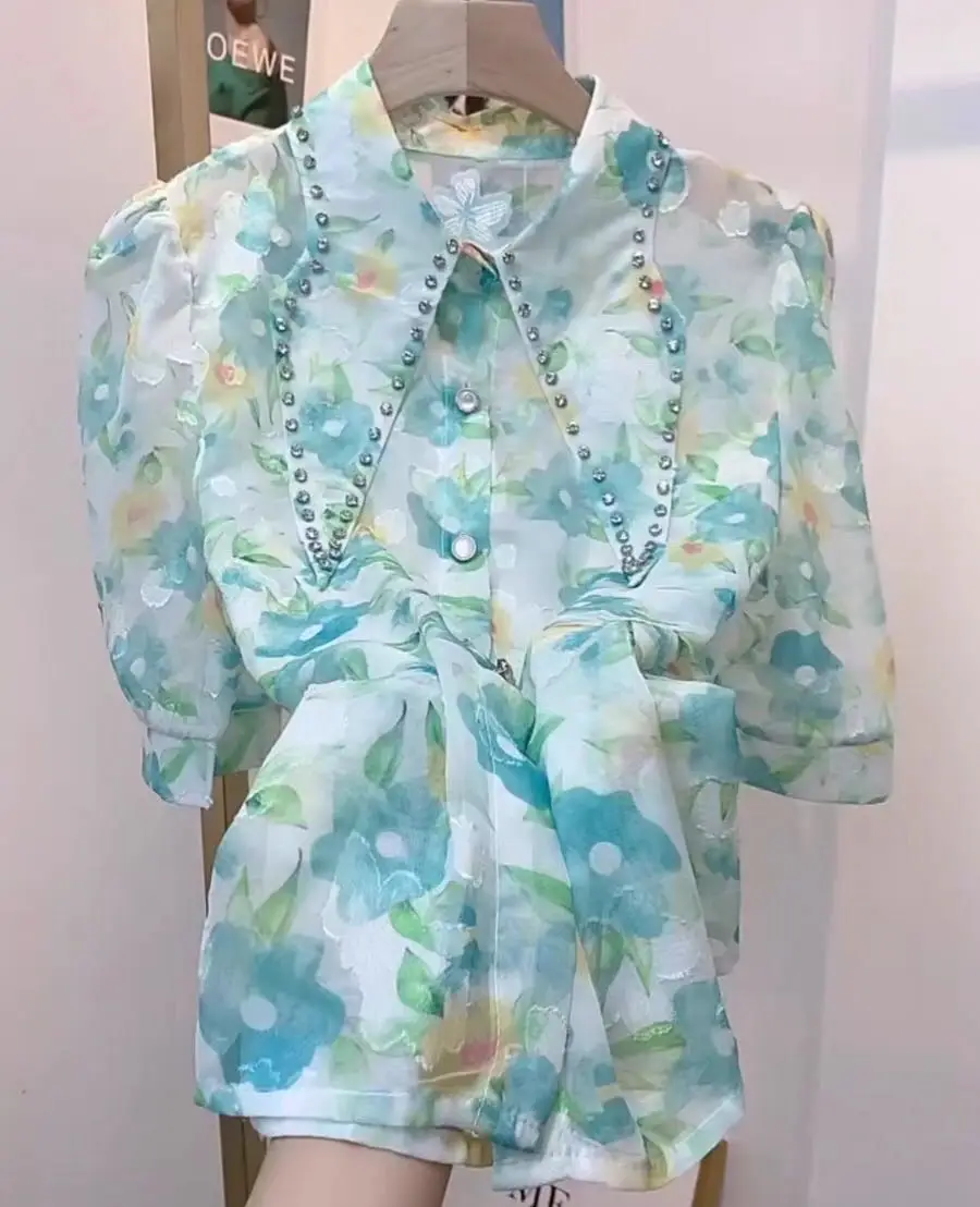 Diamond Collar Flower Printed Puff Short Sleeve Chiffon Shirt Women's Summer 2023 New Fashion Casual Blouse Top
Diamond Collar Flower Printed Puff Short Sleeve Chiffon Shirt Women's Summer 2023 New Fashion Casual Blouse Top