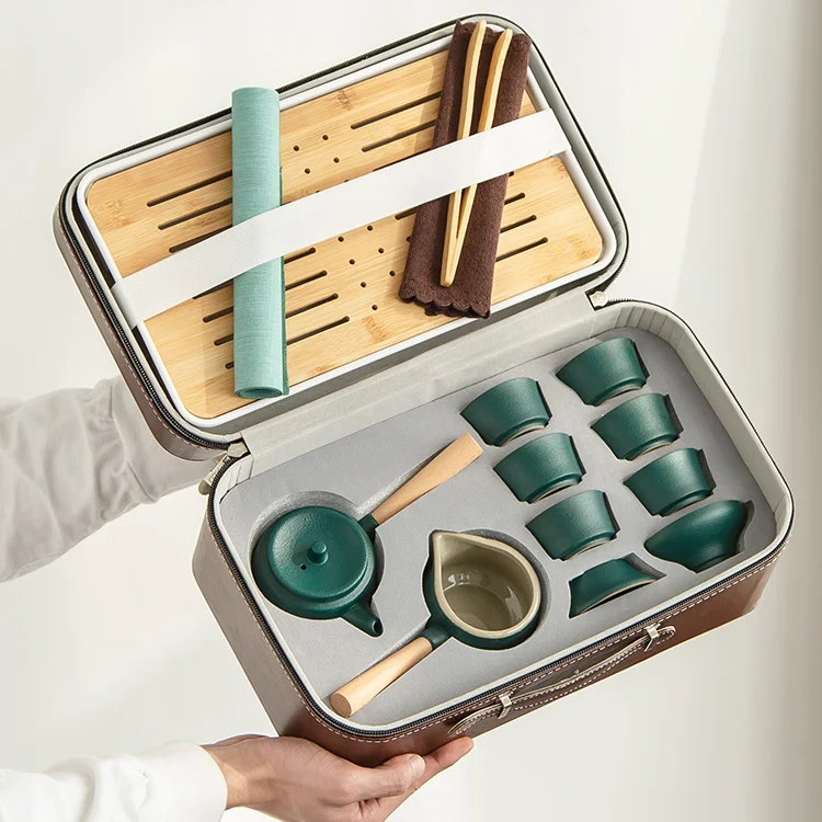 Vintage Luxury Tea Set Portable Ceramic Kung Fu Tea Table Set Travel Bowl Tea Ceremony Tetera Ceramica Kitchen Supplies DK50TS
Vintage Luxury Tea Set Portable Ceramic Kung Fu Tea Table Set Travel Bowl Tea Ceremony Tetera Ceramica Kitchen Supplies DK50TS