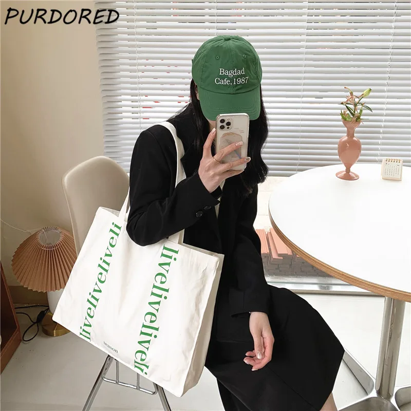 PURDORED 1 Pc Korean Style Women Letter Print Tote Bag Canvas Handbag Shopping Bag Casual Female Shoulder Bag Reusable Tote
PURDORED 1 Pc Korean Style Women Letter Print Tote Bag Canvas Handbag Shopping Bag Casual Female Shoulder Bag Reusable Tote
